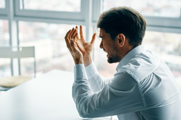 Wall Mural - man looking through window