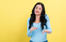 Scared Young Woman On A Yellow Background
