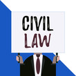 © Zofia - Conceptual hand writing showing Civil Law. Concept meaning Law concerned with private relations between members of community Man chest dressed dark suit tie face holding big rectangle