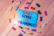 Word Writing Text What Gives You Meaning Question. Business Photo Showcasing Your Purpose Or Intentions In Life Colored Clothespin Papers Empty Reminder Wooden Floor Background Office