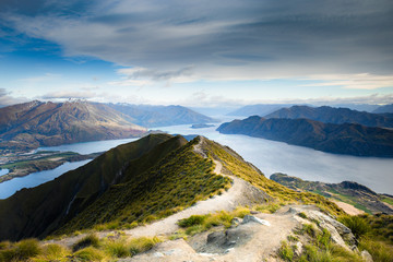 Wall Mural - New Zealand Landscape. Lake View From Mountain Peak. Roys Peak Wanaka South Island NZ. Popular Travel Tourism Destination.