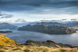 Fototapeta Zachód słońca - New Zealand Landscape. Lake View From Mountain Peak. Roys Peak Wanaka South Island NZ. Popular Travel Tourism Destination.