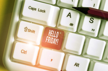 Word writing text Hello Friday. Business photo showcasing you say this for wishing and hoping another good lovely week White pc keyboard with empty note paper above white background key copy space