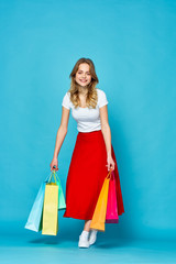 Canvas Print - young woman with shopping bags