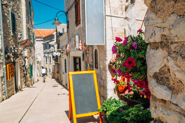 Canvas Print - Primosten old town street at summer in Croatia