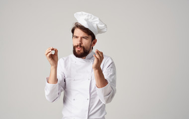 Wall Mural - cook in white uniform and hat