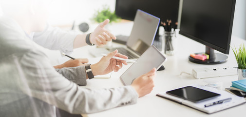 Cropped shot of young professional UX web developer working on smartphone template