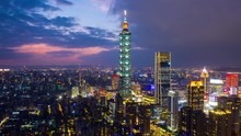 Hyper Lapse Of Cityscapse In Taipei, Taiwan. Aerial View Cityscape At Night.