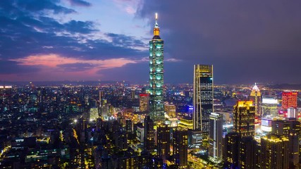 Fototapete - Hyper lapse of Cityscapse in Taipei, Taiwan. Aerial view cityscape at night.