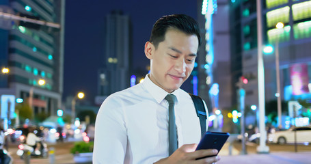 businessman use phone outdoor