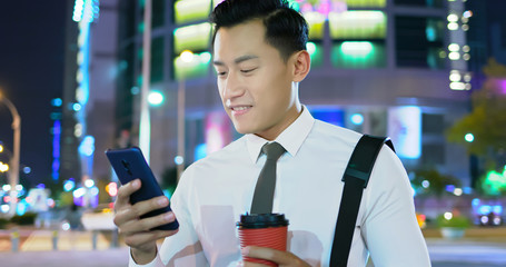 Poster - businessman use phone outdoor