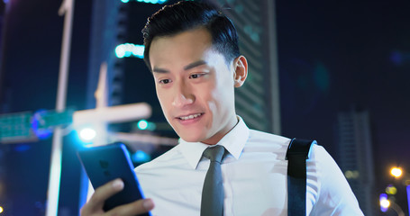 Poster - businessman use phone outdoor