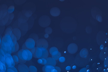 Abstract bokeh lights with light Blue background