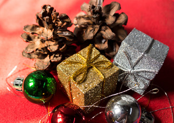 christmas gifts and decorations on red background