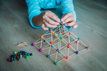 Wall Mural - child making geometric shapes, engineering and STEM education