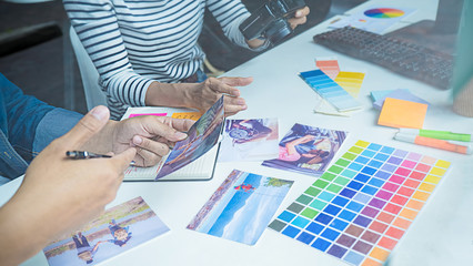 Wall Mural - Advertising agency designer creative start-up team discussing ideas in office.