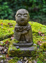 Stone Statue Of Smiling Jizo Bosatsu