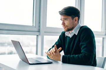 businessman working on laptop in office