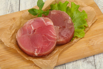 Raw tuna round steak for grill