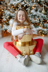 Wall Mural - Little girl in christmas at home. 