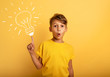 © alphaspirit - Emotional Child have a big idea. Surprised and amazed face expression. Yellow background