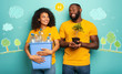 © alphaspirit - Happy couple hold a plastic container with bottles and a small tree over a light blue color. Concept of ecology, conservation, recycling and sustainability