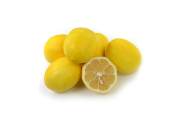 Wall Mural - Heap of lemon. Juicy yellow slice of lemon on a white background isolated. Cut lemon fruits isolated on white background.