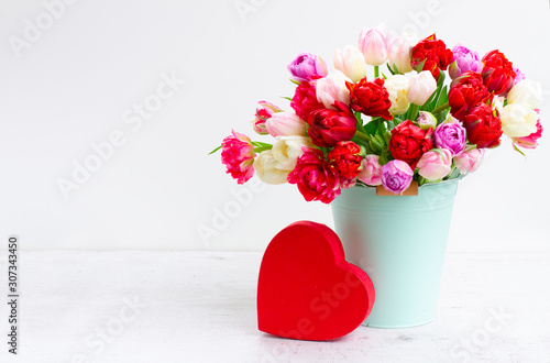 Fresh tulips flowers with heart