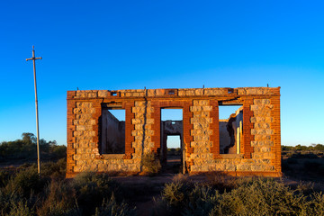 Abandoned ruins of an old homestead in the desert near the historic mining town of Silverton in outback New South Wales, Australia.