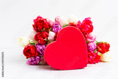 Fresh tulips flowers with heart