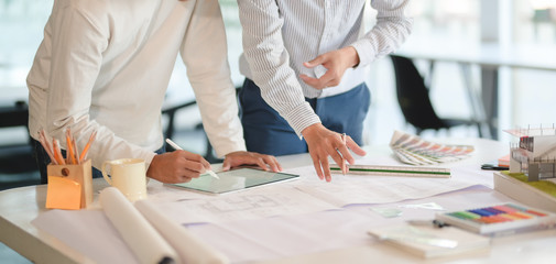 Canvas Print - cropped shot of architect and engineer working together on construction project