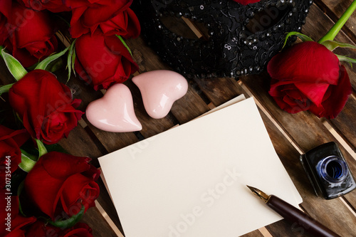 dark red roses on table