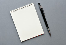 Empty Notebook And Pen - Top View. High Resolution Photo.