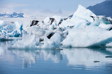 Wall Mural - Sunshine over Jokulsarlon glacier lake in Iceland