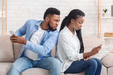 Angry Husband Catching Cheating Wife Texting On Cellphone With Another Man