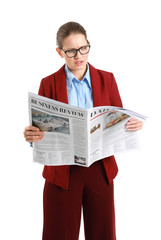 Poster - Young businesswoman with newspaper on white background