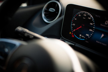 Wall Mural - Digital speedometer on a modern car dashboard