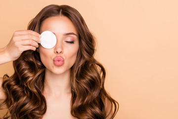 Wall Mural - close up photo of charming curly haired lady apply cleansing lotion to make her skin clear clean in 