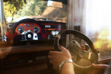 Man Learns How To Drive The Car On The Virtual  Driving Auto Simulator