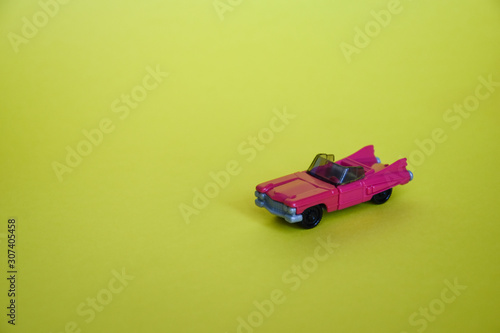 yellow and red toy car