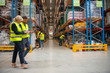 © Stock Rocket - Working in warehouse, managers and workers