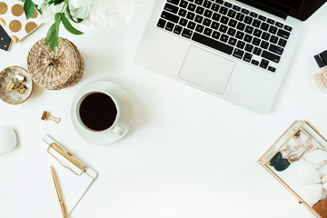 Wall Mural - Home office desk table workspace with laptop and coffee on white background. Flat lay, top view freelance work concept.