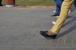 © Андрей Букреев - walking on city streets with shoes and athletic shoes