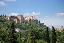 View To Alhambra Form Sacromonte Village Famous For Its Houses Made In Caves At The Hill Slopes, Granada, Spain