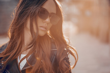Beautiful woman in sunglasses in outdoor