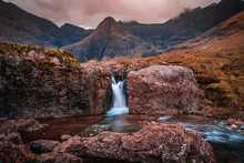 Fairy Pools Waterfall In The Isle Of Skye, Scotland Located Next To Glen Brittle In The Scottish Highlands. Natural Magical Place With Vivid Colors And Crystal Clear Blue Pools On The River.