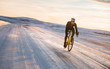 © Johnér - Man cycling at winter