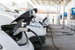 © Luis Cerdeira/Stocksy - Charging of an electric car
