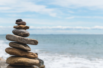 Balansed Stacked stones on the beach