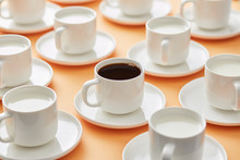 Cups With Coffee And Milk In Layout